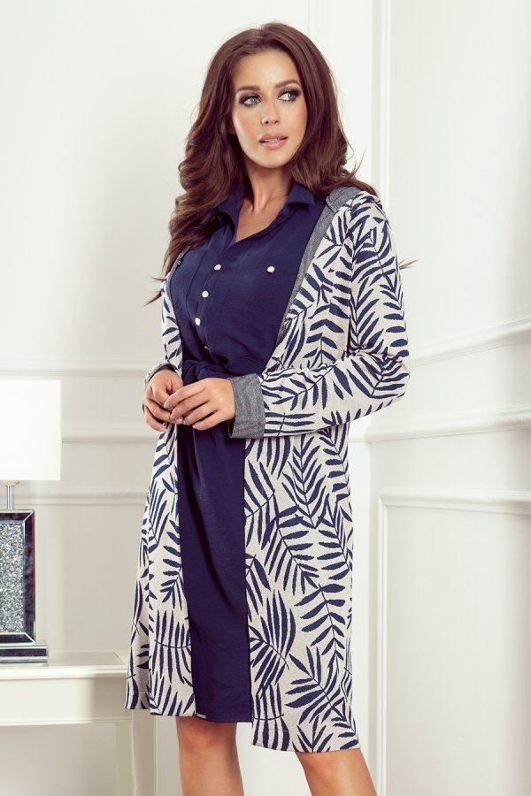 Elegancki kardigan damski z wzorem liści, idealny na chłodniejsze dni. Wykonany z miękkiego materiału, zapewnia komfort i styl. Doskonały do casualowych i eleganckich stylizacji.